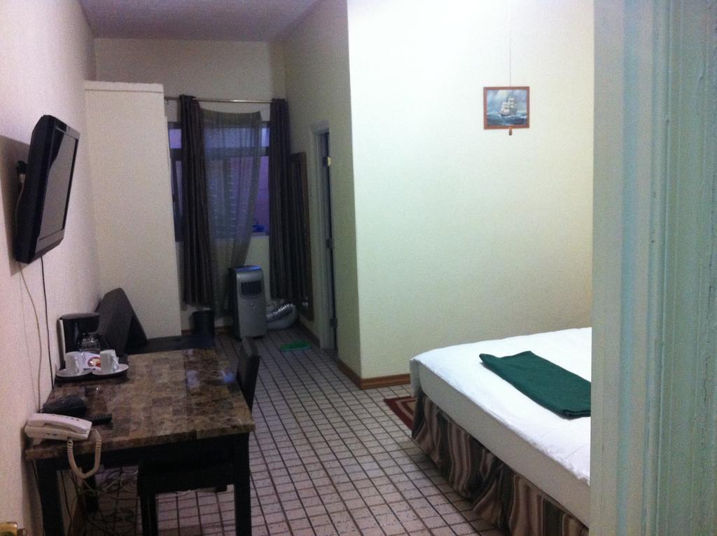Executive Airport Hotel Ентебе Стая снимка